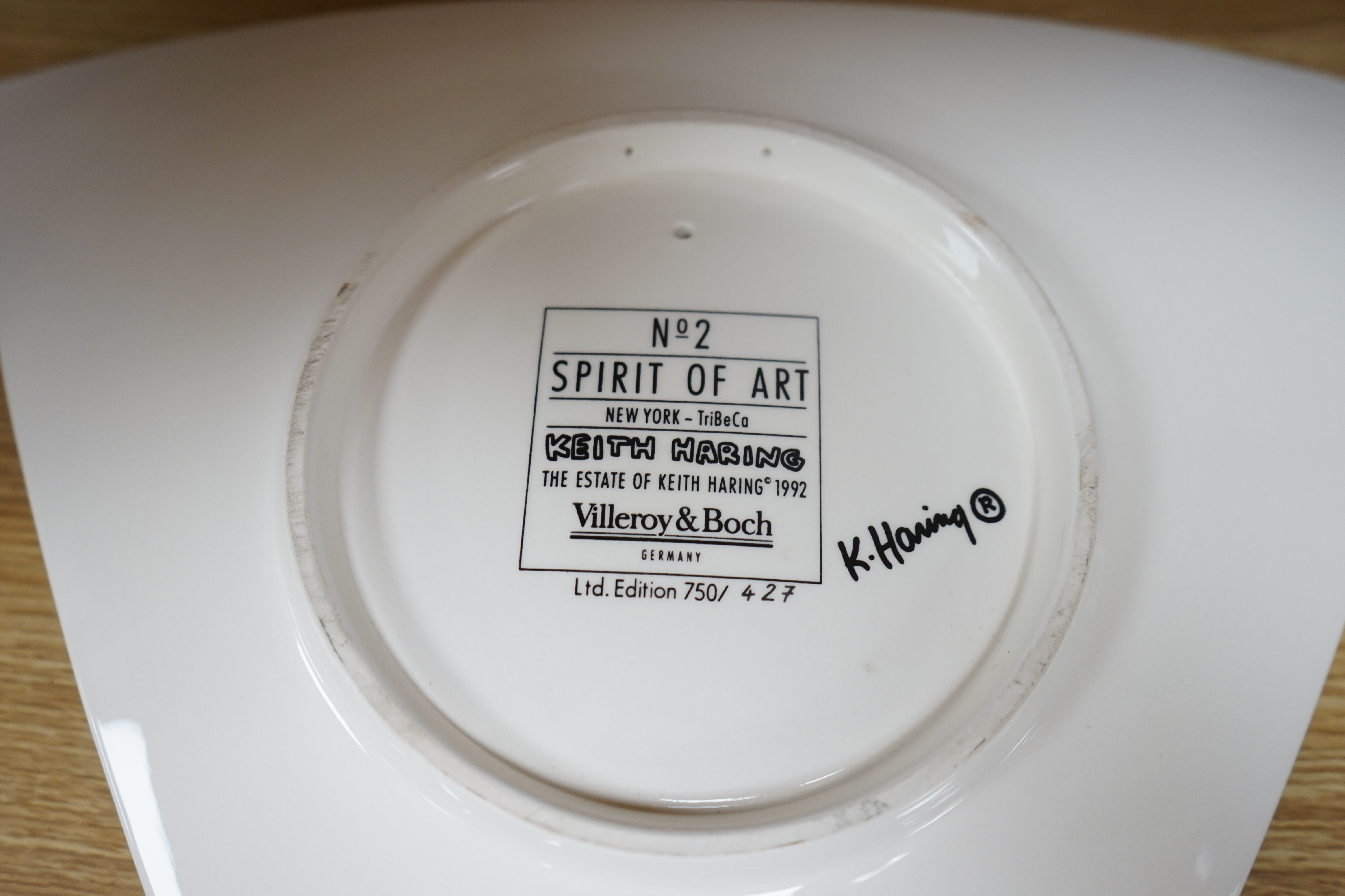 Keith Haring (American, 1958-1990), Spirit of Art No.2, Edition New York porcelain dish manufactured as a limited edition by Villeroy & Boch in 1992, numbered 427/750, 39cm wide. Condition - good